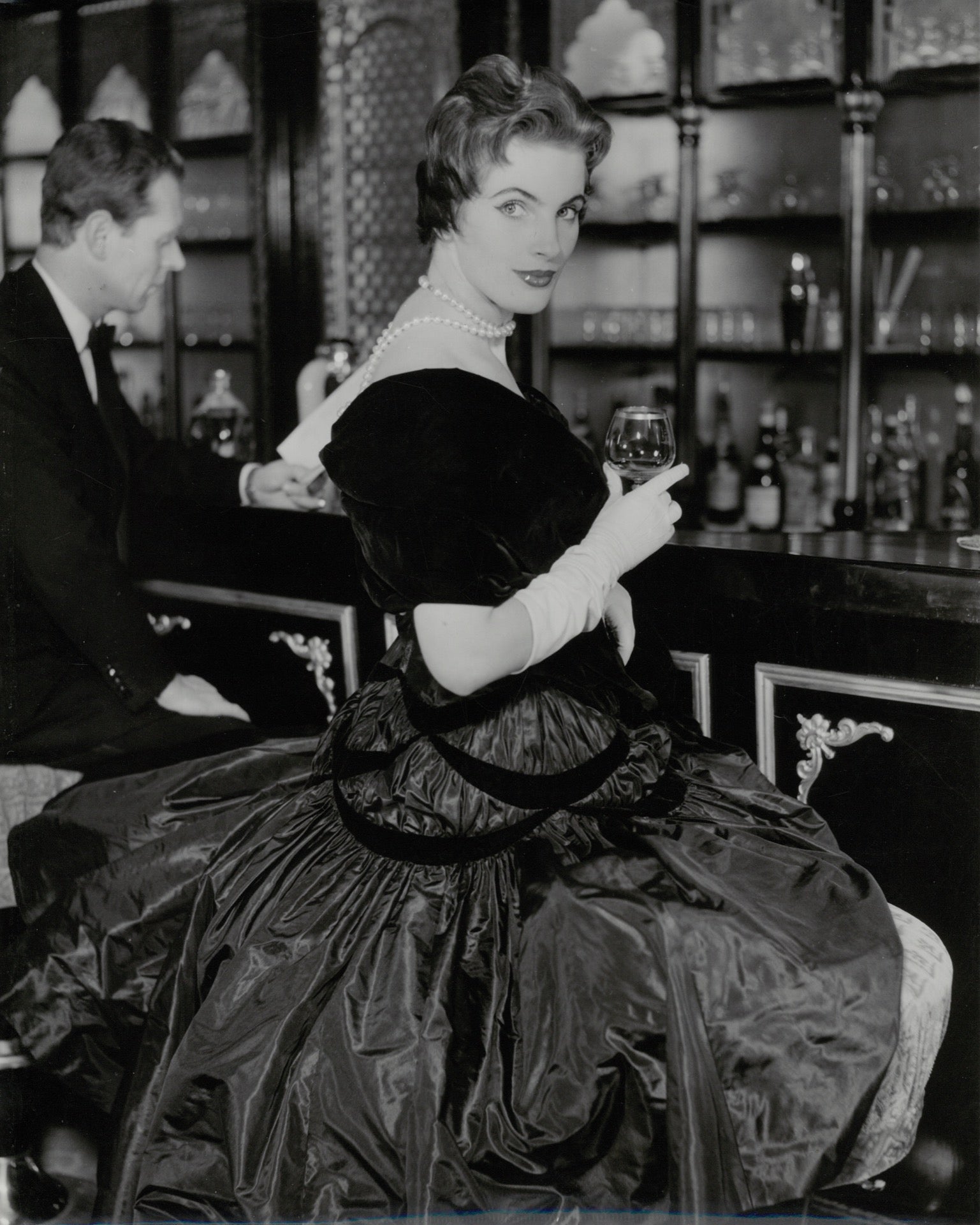 Dita Marlow in a cocktail dress