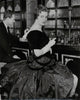 Dita Marlow in a cocktail dress