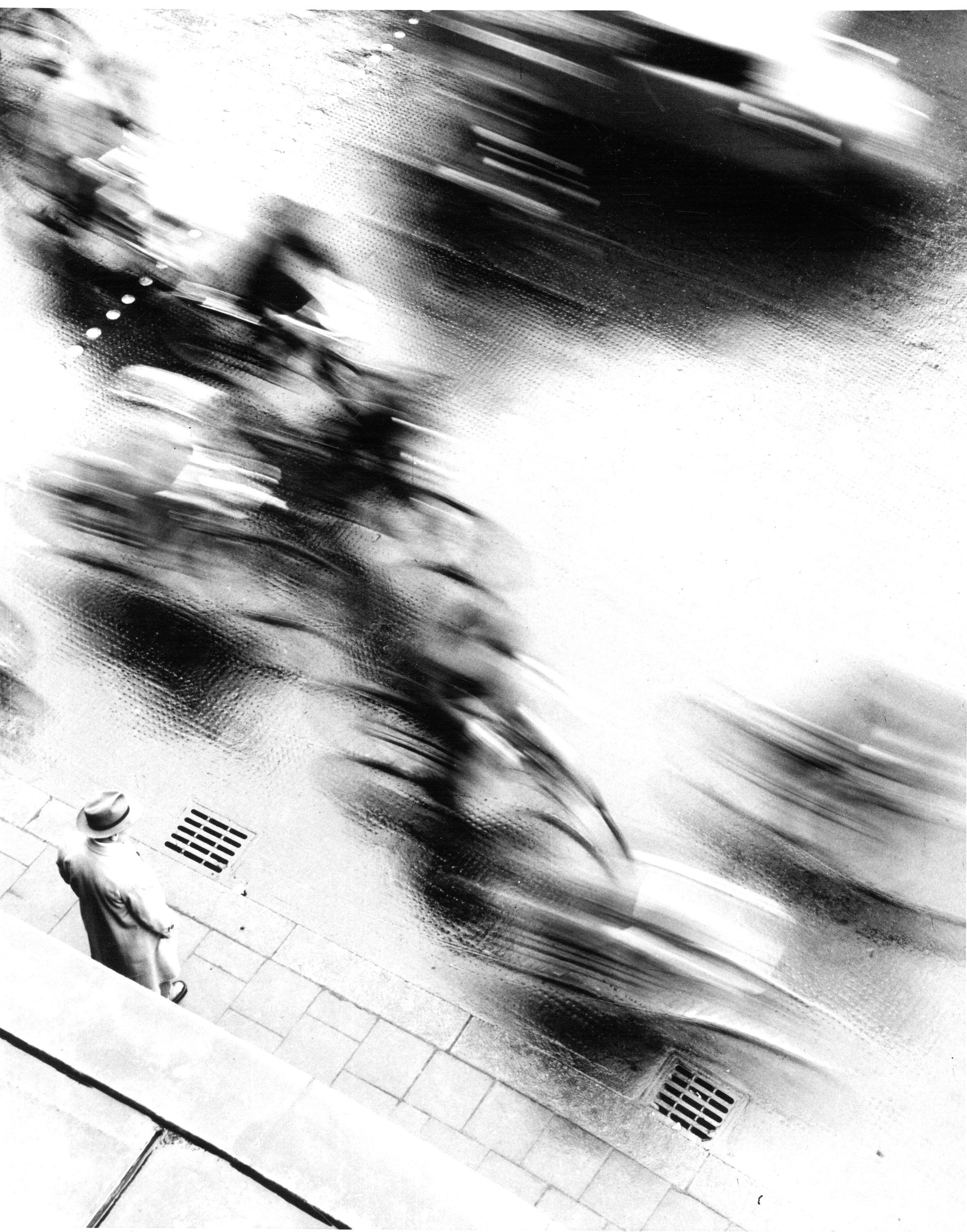 A man looks out onto the street