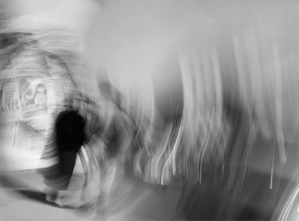 People next to advertising column II