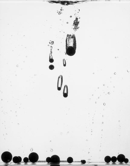 Spheres fall into the water