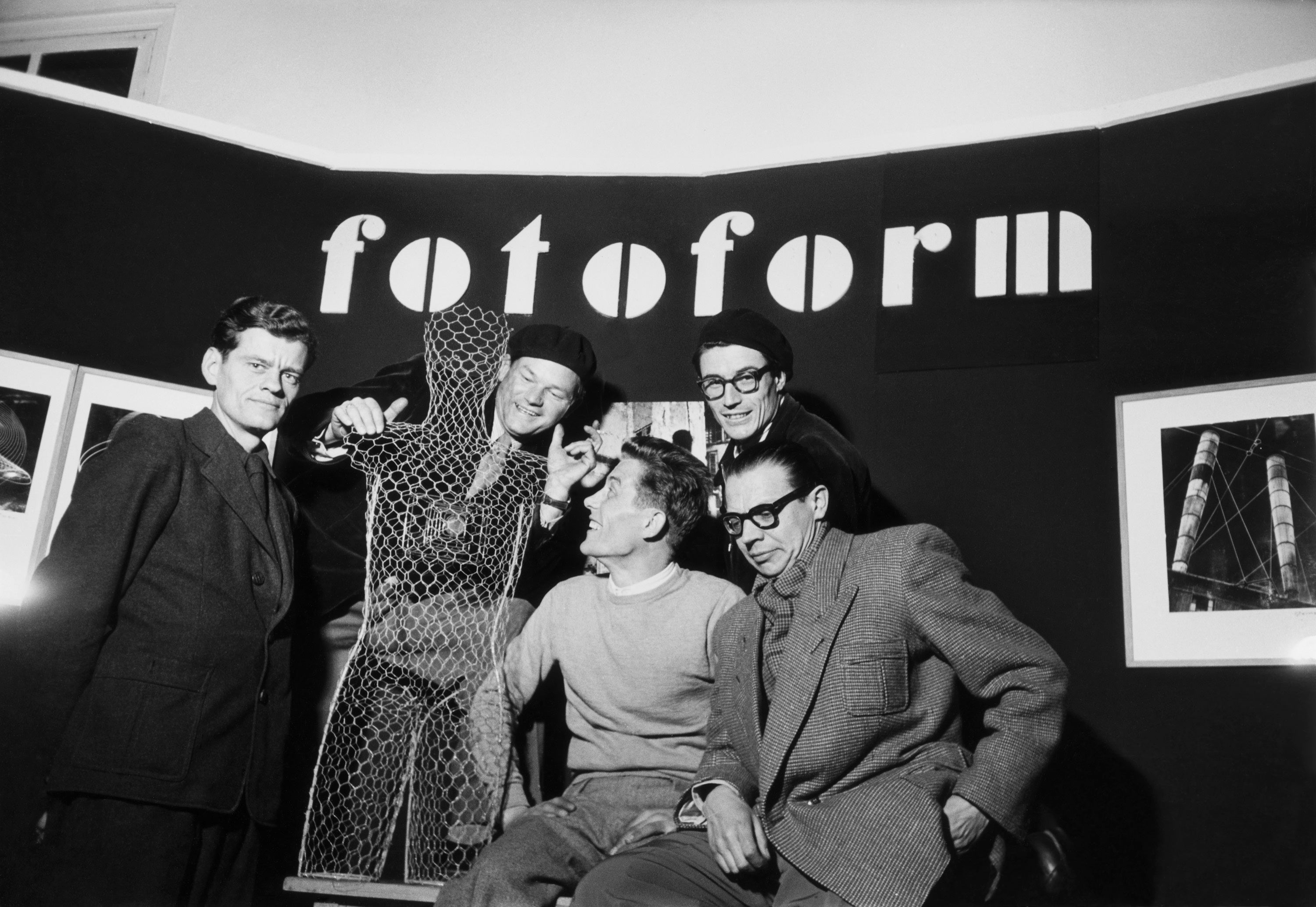 Five of the six members of the 