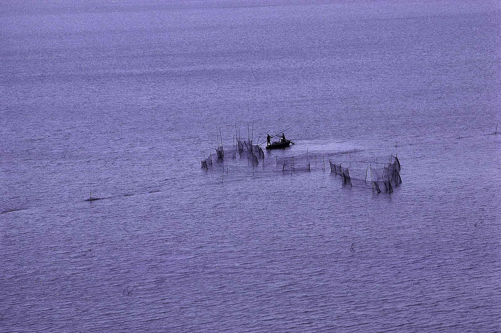 Fishing boat and fishing nets on Lake Taihu near Wuxi